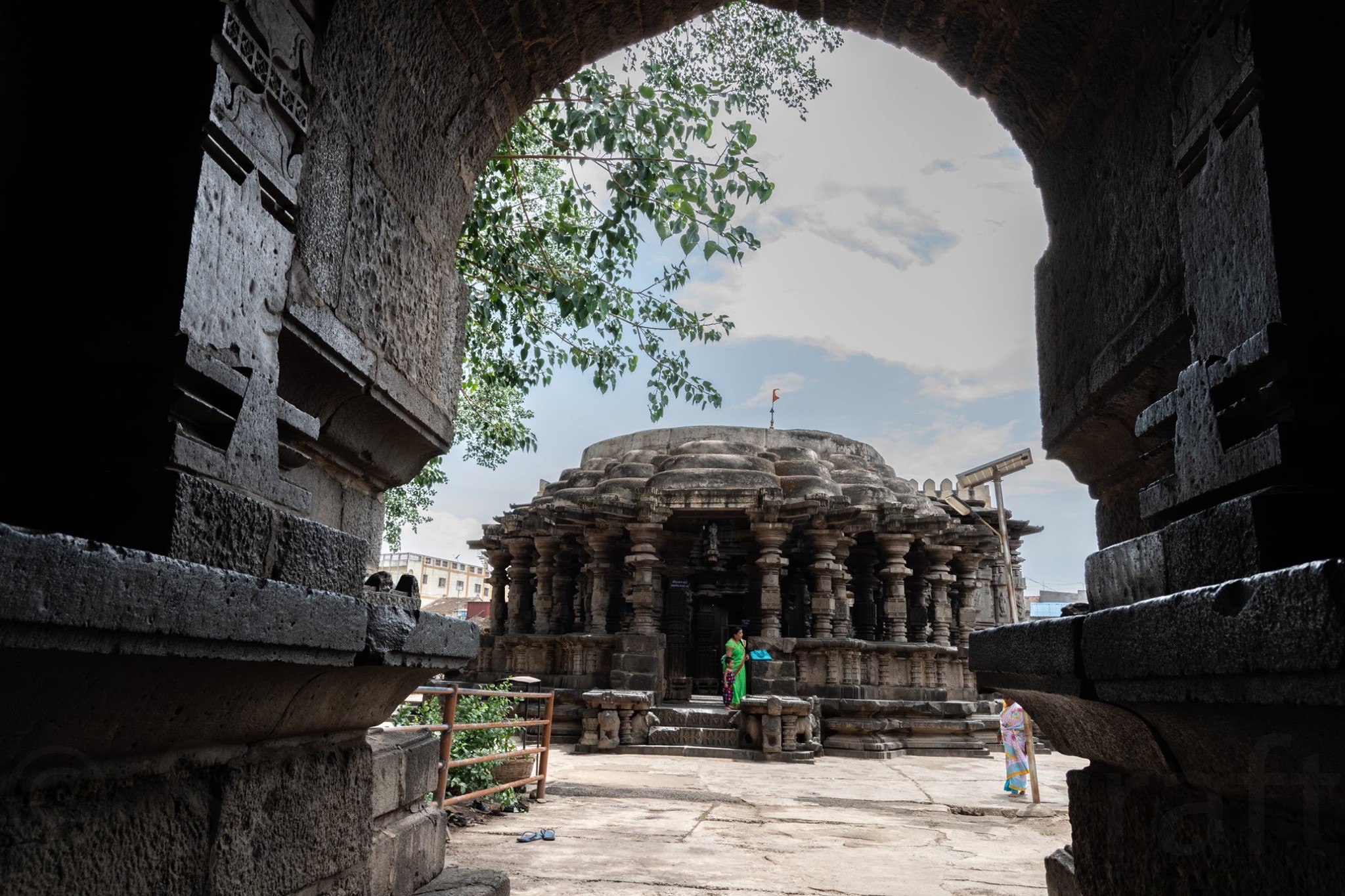 Major deities can be found in the temple in 'ling' form - Shiva and Vishnu. While Shiva is referred to as 'Kopeshwar Mahadev', Vishnu is referred to as 'Dhopeshwar'. 
In the story, since Nandi had accompanied Sati, i.e. gone away with Sati, one does not find its idol in the temple as it exists in every Shiva temple. Apart from these idols, the temple is studded with stunning carvings of gods and goddesses.