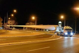 The first blade made its way from Brisbane to Cooranga North overnight, arriving early this morning. This giant wind farm turbine blade weighs 24 tonnes, is 70 m long and the 1st of 369 blades that will eventually arrive at the farm. 6 months of planning went in to its trip to site.