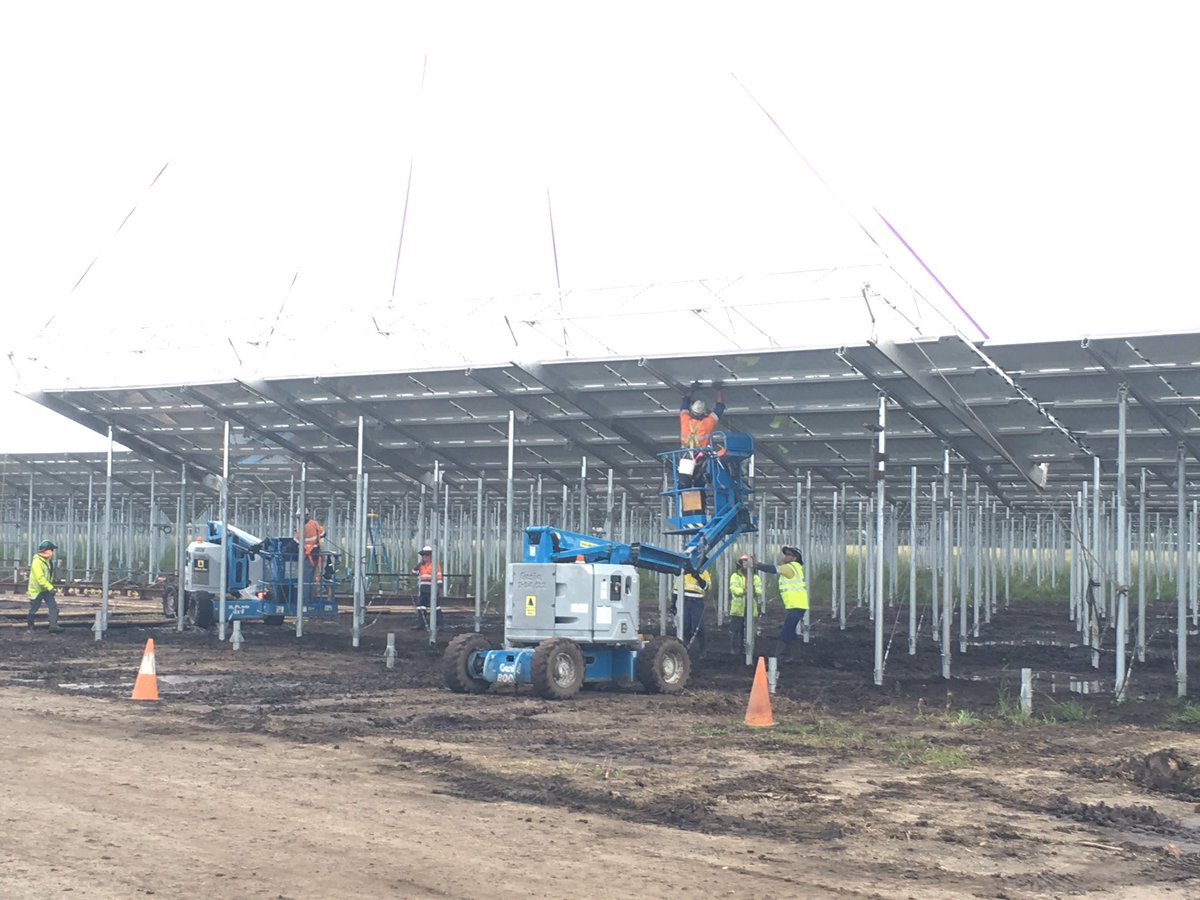 Last of the 57,800 panels bolted in place.