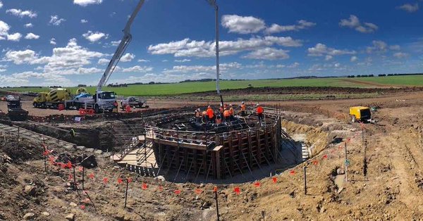 Concrete pouring for foundation of first turbine commences.