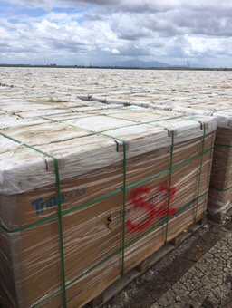 Sea of solar panels awaiting to be installed at the farm.