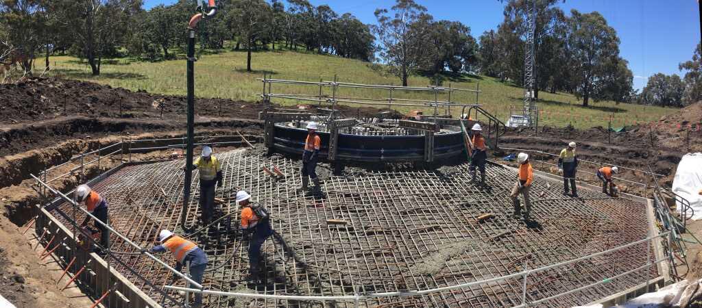 The 75th and final foundation pour being completed.